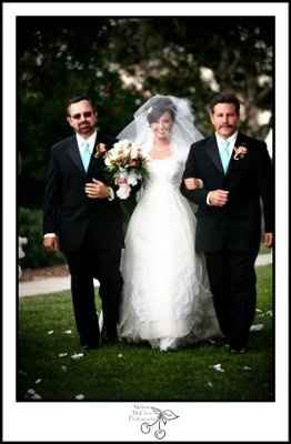 Two Fathers.. Walk down the aisle with both of them, or alone?