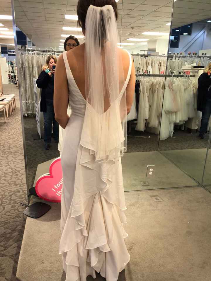 when I saw the dress with the bustle, I knew it was the one for me.