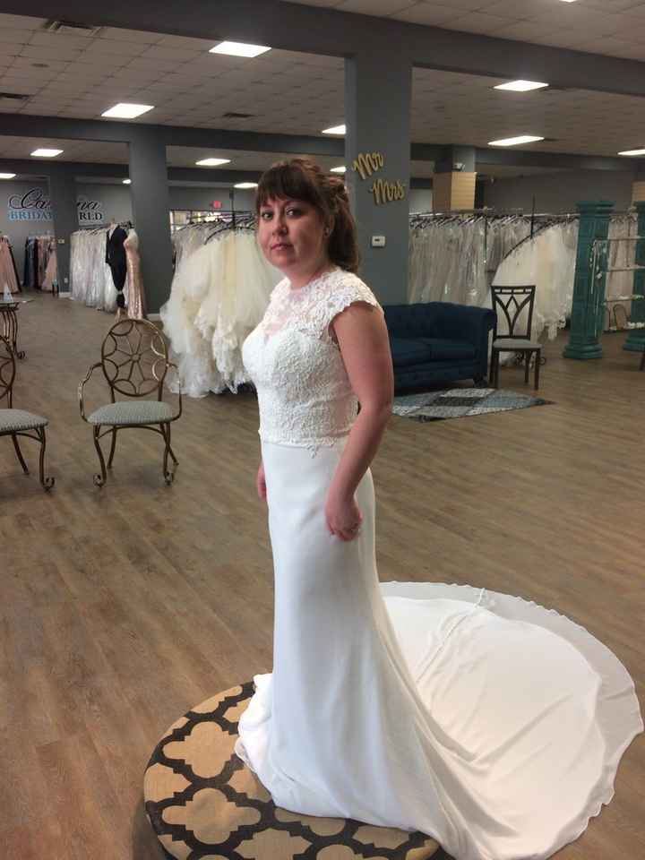 Here's me in the dress when my size came in but before my initial fitting, weird angle for my chubby