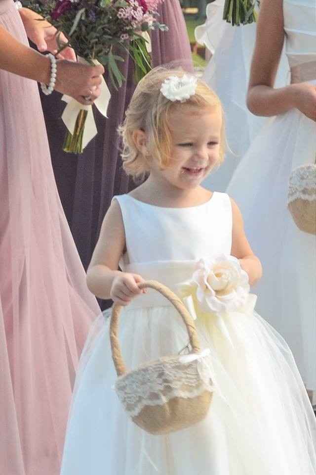 What are flowers girls dress based on?