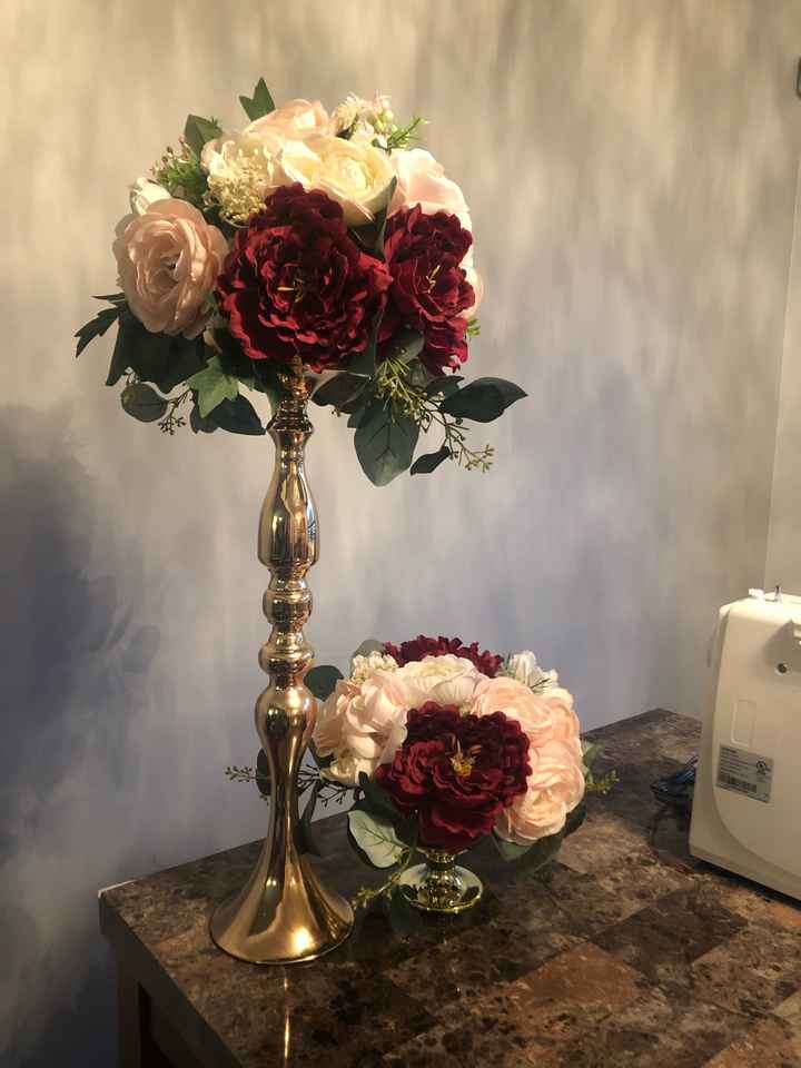 Does it look funny if the centerpieces are different colors? - 1