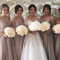 Long Bridesmaid Dresses and Groom and Groomsmen in suspenders and/or vest