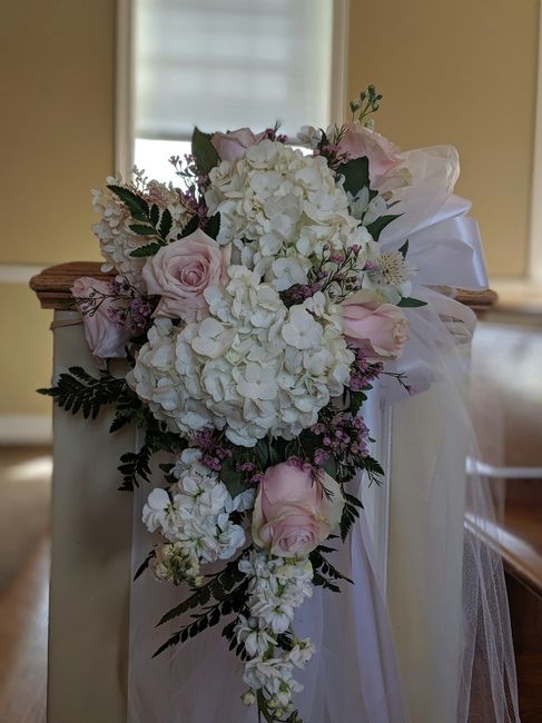 Flowers on pews