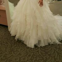 Any Davids Bridal employees out there? Or anyone who's experienced their alterations