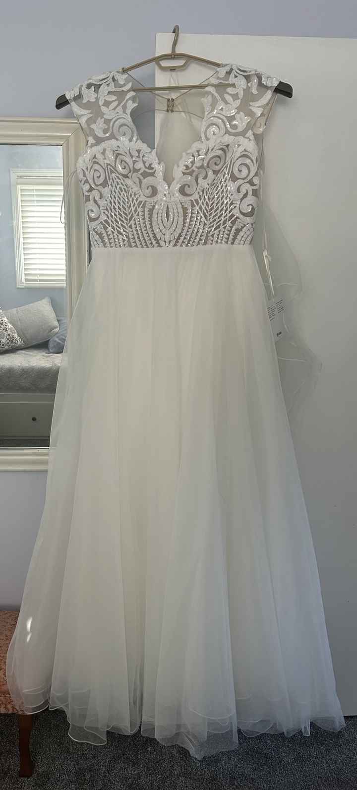 Where to sell an unworn, unaltered designer wedding gown? - 2