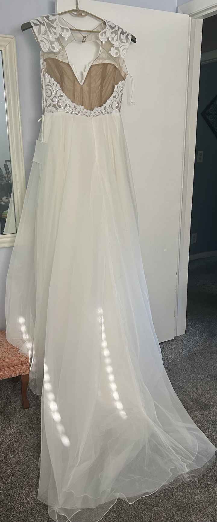Where to sell an unworn, unaltered designer wedding gown? - 3
