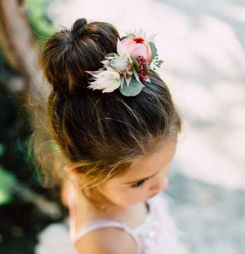 You could do a bun with some kind of decoration like a headband of flowers