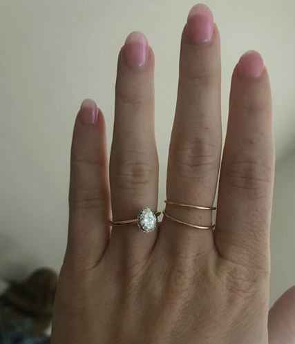 Two-tone rose and white gold solitaire with hidden halo 