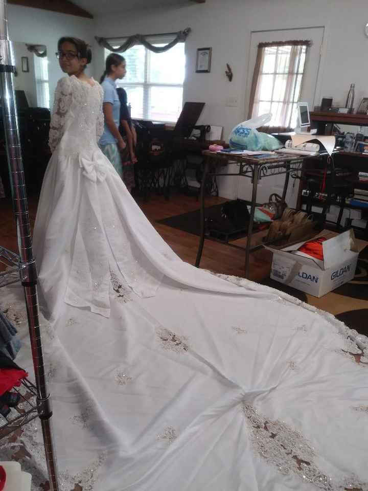 wedding dress with the train spread out
