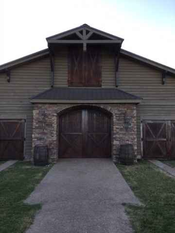The ceremony location! We will be standing in front of the door archway. The barrels can be removed 