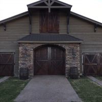 The ceremony location! We will be standing in front of the door archway. The barrels can be removed 