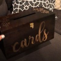 bought a plain wooden box with a slot on top and designed it with foiled vinyl.