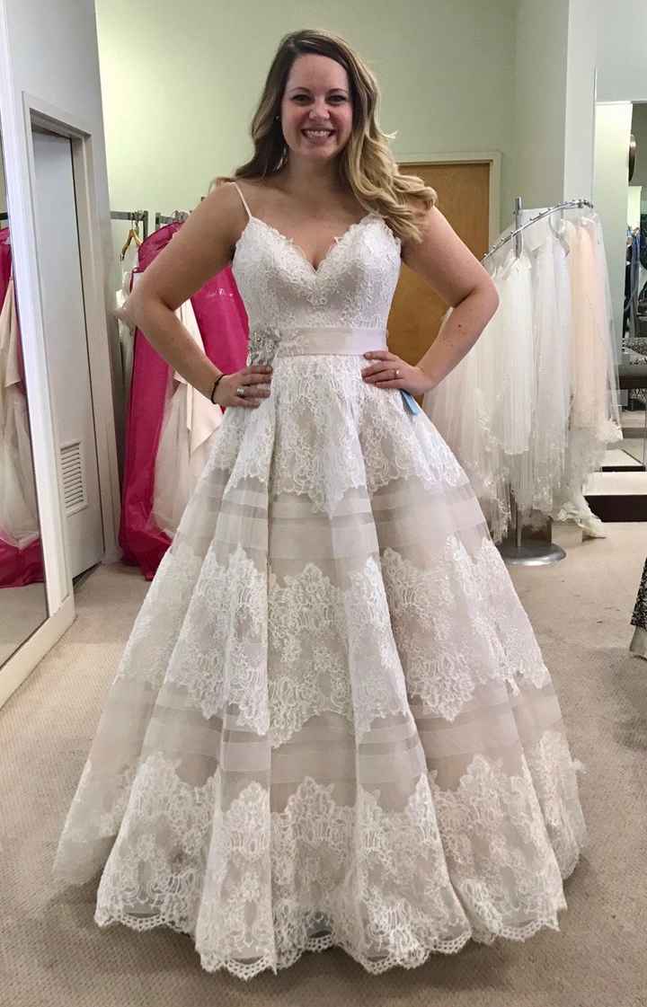 Taking out a wedding dress clearance