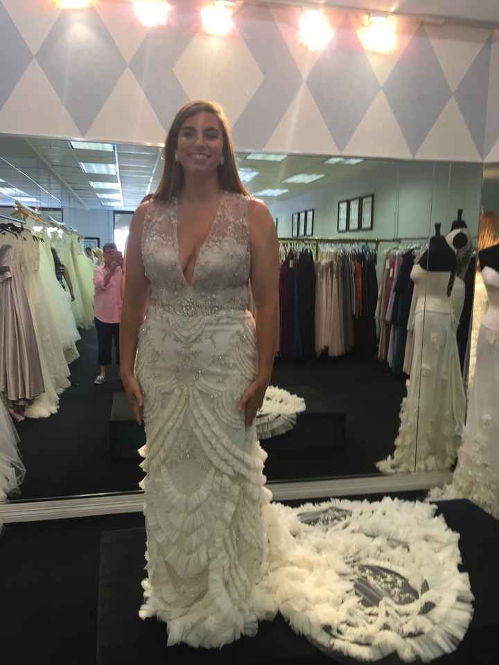 Show me your wedding dresses, and tell me where they are from,and the cost? :)