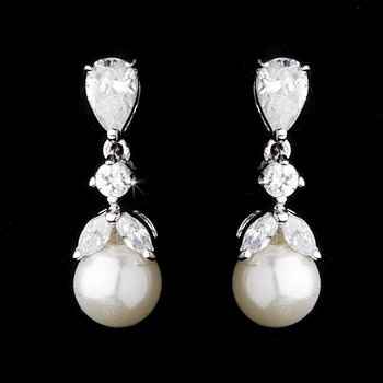 Poll:  Which earrings do you like better with my bracelet and hair comb