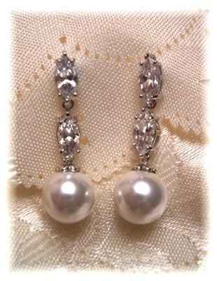 Poll:  Which earrings do you like better with my bracelet and hair comb