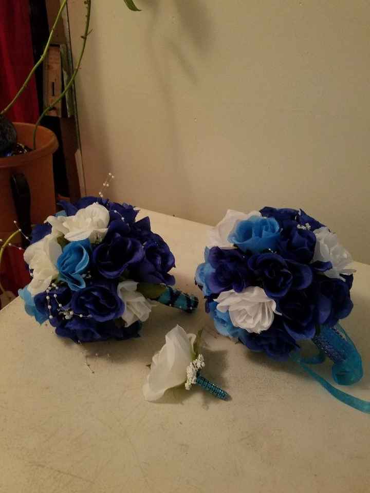 brides maids & grooms men( blue  & white silk roses)