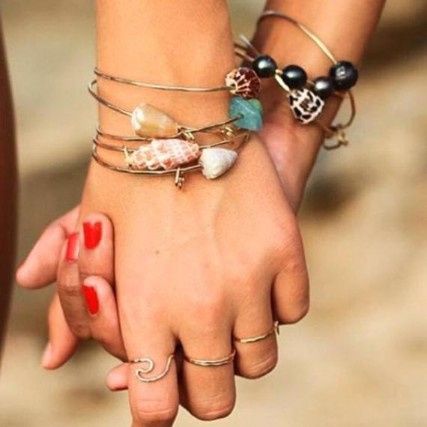 https://www.etsy.com/listing/468557606/hawaiian-shell-bangle-with-heart-charm?ga_order=most_relevant