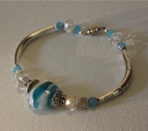 https://www.etsy.com/listing/612546803/blue-and-silver-crystal-bangle?ga_order=most_relevant&ga_sear
