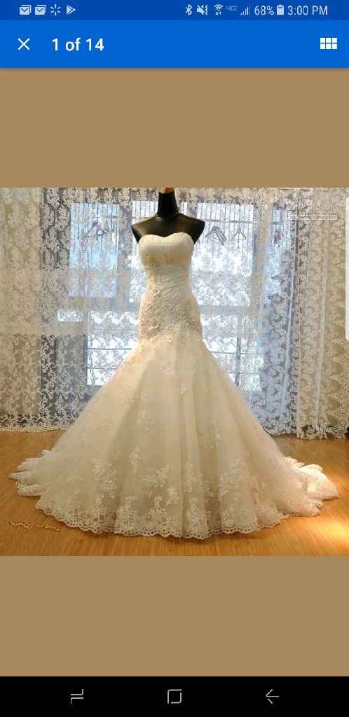 Who is your wedding dress designer? - 1
