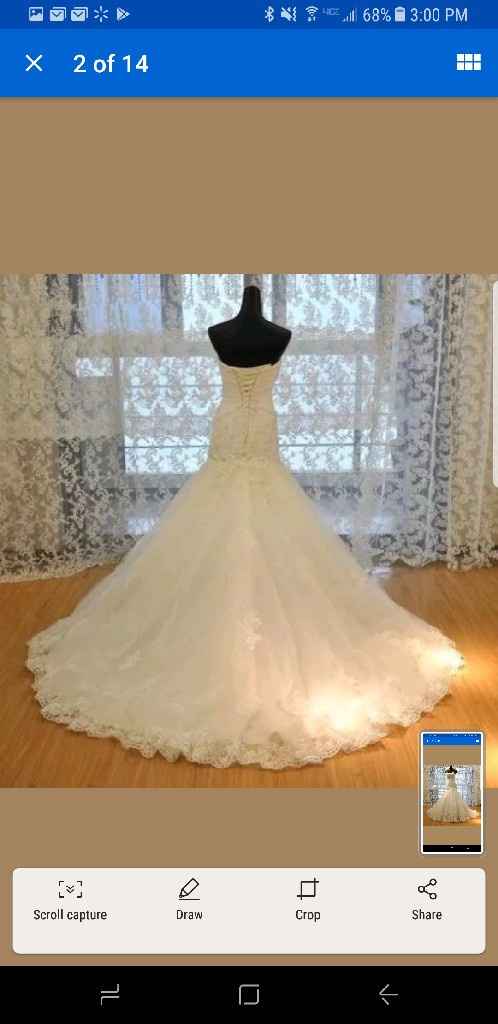 Who is your wedding dress designer? - 2