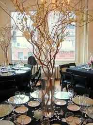 using lights in branches for centerpieces