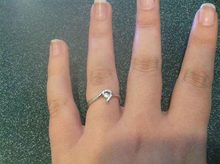 How much of a faux pas would it be to wear the engagement ring as the closest ring and the wedding b