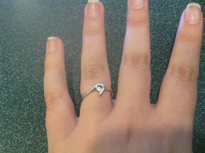 How much of a faux pas would it be to wear the engagement ring as the closest ring and the wedding b