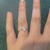 How much of a faux pas would it be to wear the engagement ring as the closest ring and the wedding b