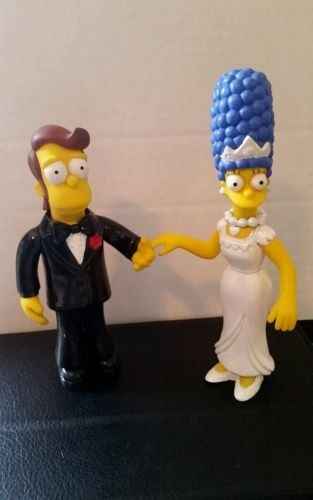 We just won our cake topper on ebay!