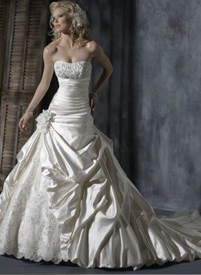 So you said yes to the dress.... now let's see it! :)