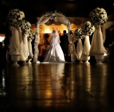 I need decoration ideas for our new ceremony venue, something besides those ball things! **pix**