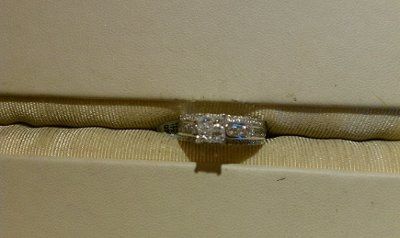 What makes a girl smile again? Dress and Rings:)