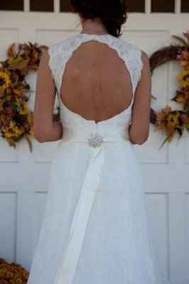 Strings From a Lace Up Back - Sq Knot and Brooche - Thoughts Hayley(others too) - Pics