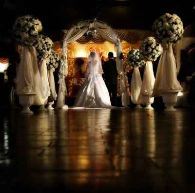 I need decoration ideas for our new ceremony venue, something besides those ball things! **pix**