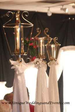 I need decoration ideas for our new ceremony venue, something besides those ball things! **pix**