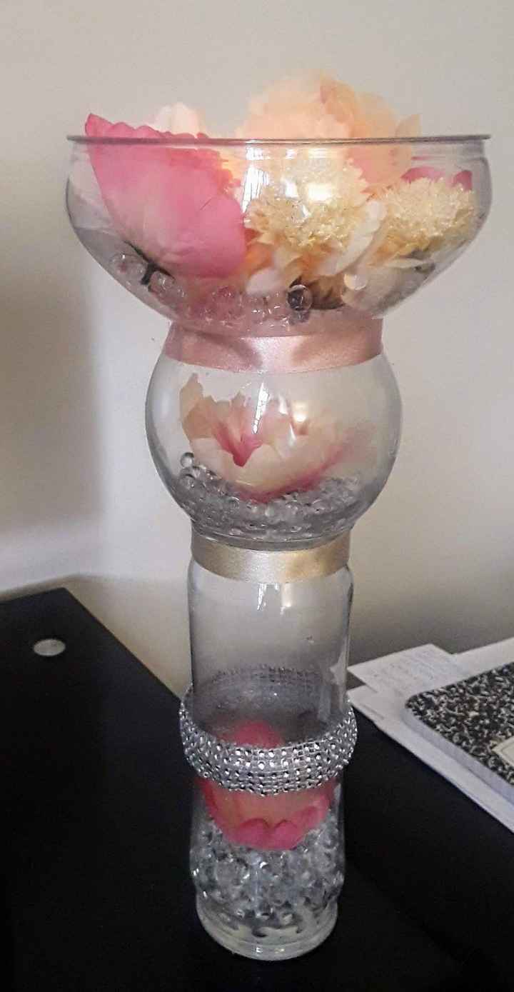 Added faux flowers water beads, ribbon, LED tealights, and a little bling!