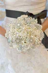 I have to have one of these!!! Brooch Bouquet with lots of BLING!
