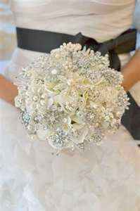 I have to have one of these!!! Brooch Bouquet with lots of BLING!