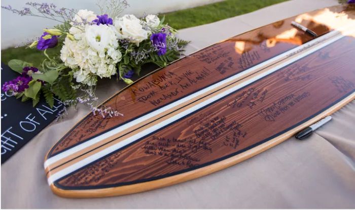 Our custom surfboard guestbook finally came! - 1