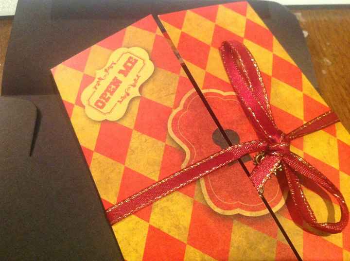 Tied with red & gold ribbon and a tiny key.