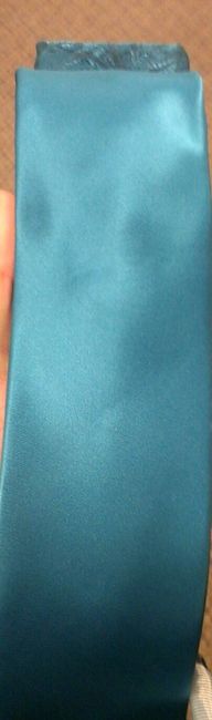 Blush wedding gown.. Teal bridesmaids?
