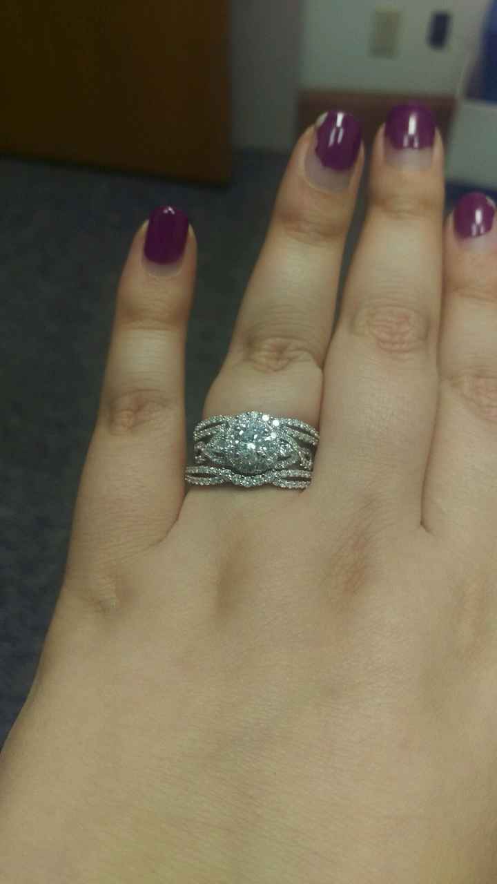 I have to share... we picked up our wedding bands! I LOVE FH's custom ring!