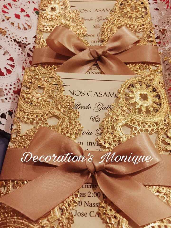 The actual invitation paper is ivory but the gate fold is gold and the bow is a pastel/blush shade o