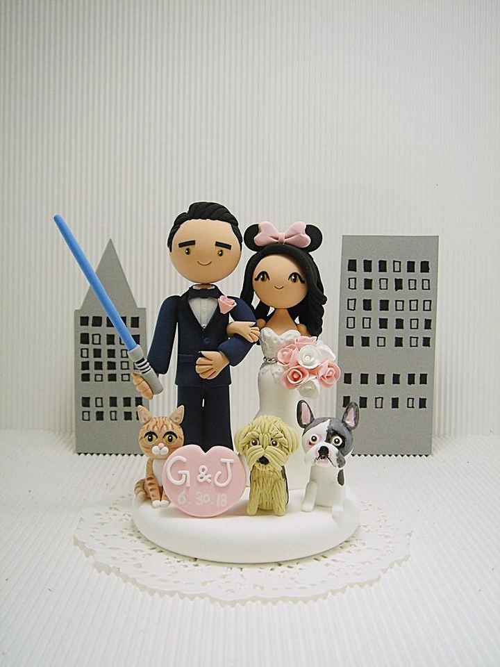 our custom cake topper they even got his hand tattoo lol!