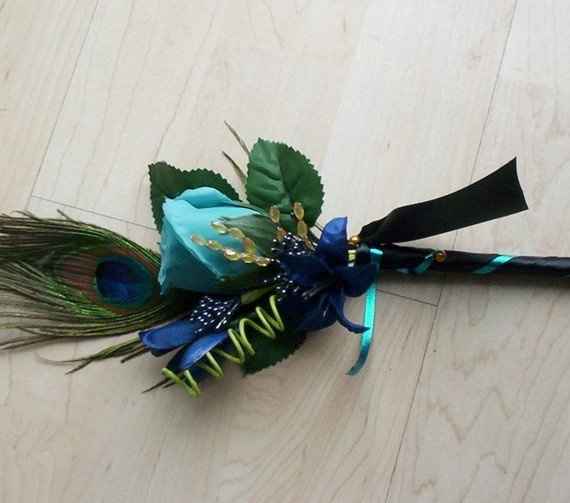 Help need ideas for bridemaids bouquet, peacock theme, cant afford flowers.
