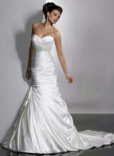 How much did you spend on your wedding dress??