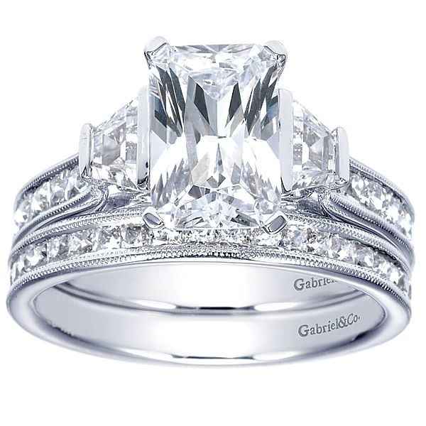 Three stone E-ring? Let's see your wedding band!