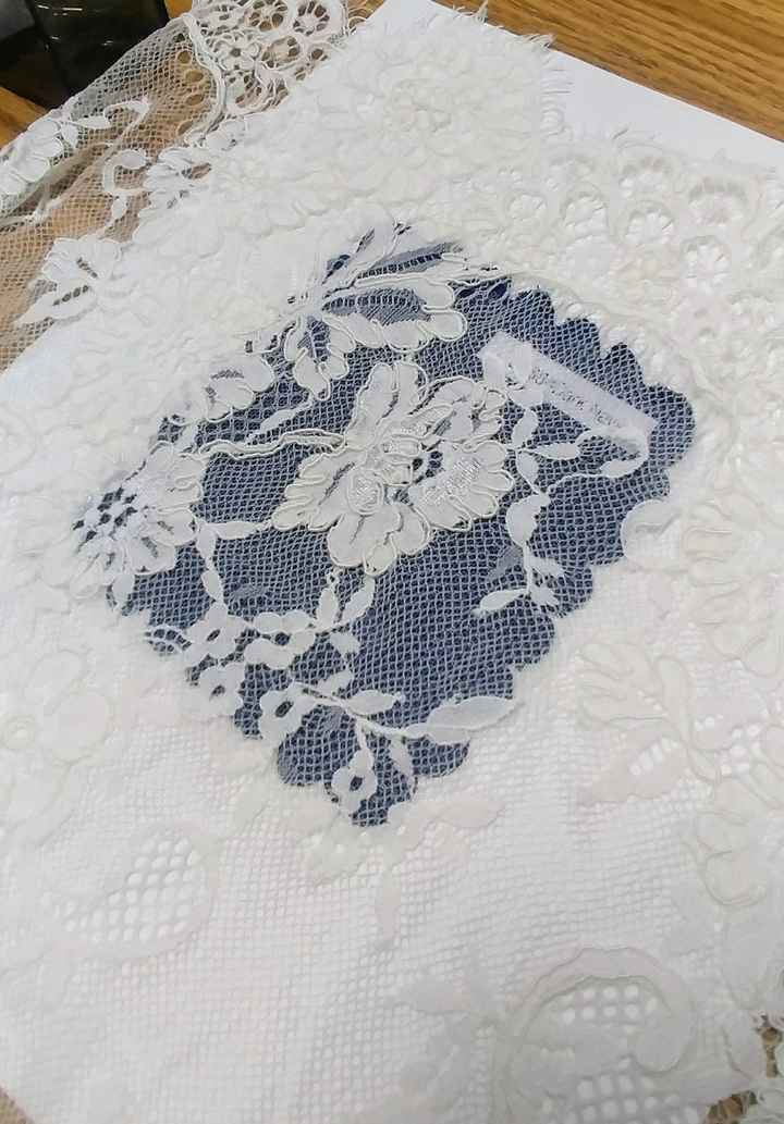 Ivory lace over navy satin