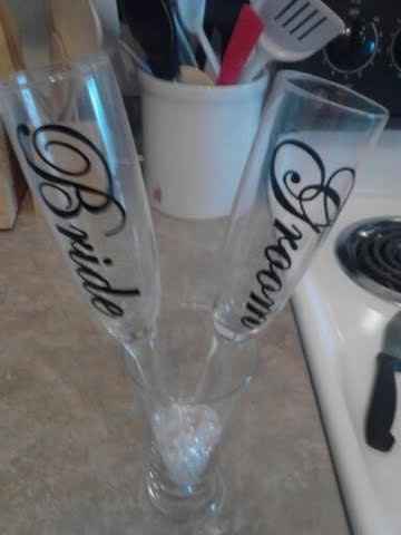 My DIY pew ends, toasting flutes, and table numbers